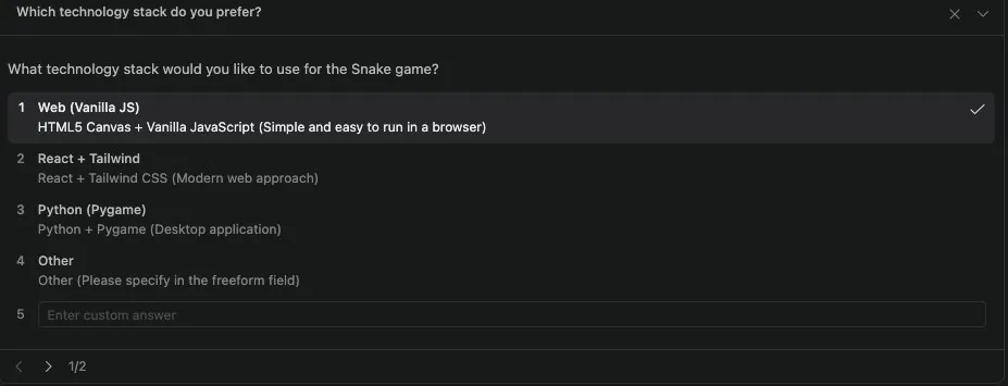 Gemma 4's planning dialog asking which technology stack to use for the Snake game, with options for vanilla JS, React and Tailwind, and Pygame
